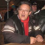 Claude B.